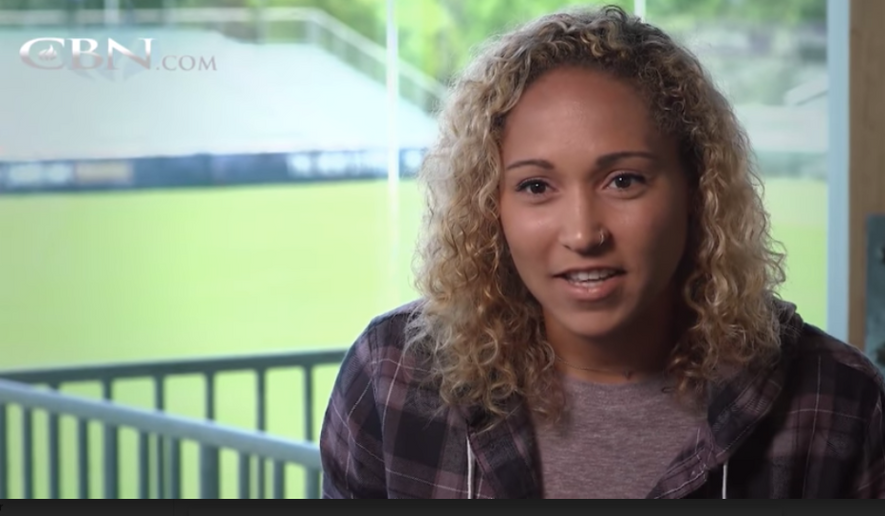 Jaelene Hinkle, a professional women&#39;s soccer player shown here in a 2018 CBN interview, famously refused to wear rainbox-colored jerseys in honor of LGBT Pride Month in a 2017 friendly match. Many observers believe Ms. Hinkle&#39;s faith-informed decision, considered by detractors to have been homophobic, was a factor in her not making the roster for the 2019 U.S. Women&#39;s National Team. (CBN.com screen capture) 