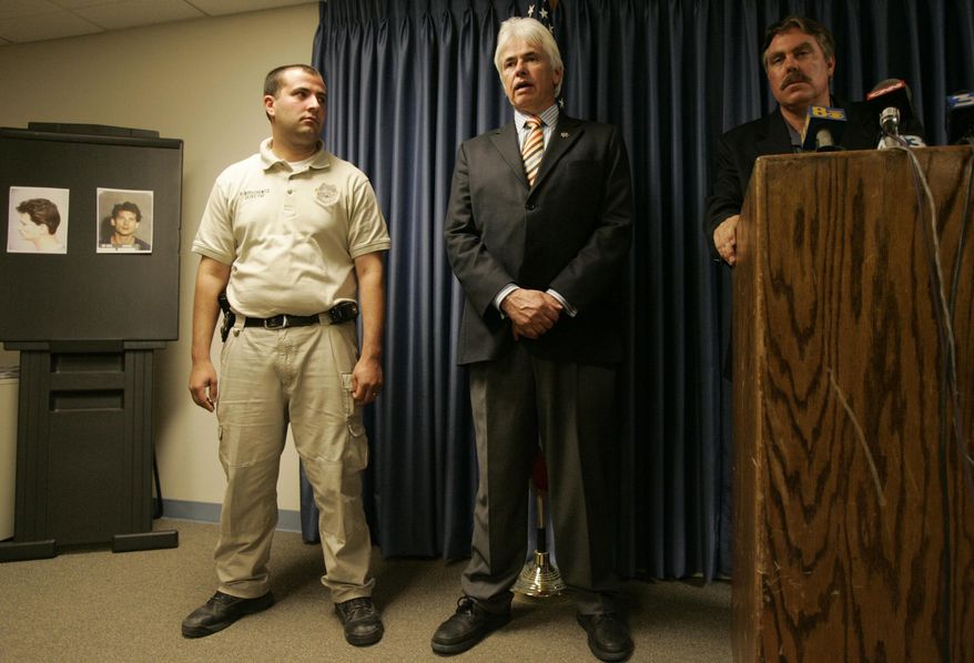 FILE - In this Sept. 28, 2007 file photo, Nye County Sheriff Tony DeMeo, center, speaks as he is flanked by detective David Boruchowitz, left, and Nye County District Attorney Robert Beckett during a news conference in Pahrump, Nev. Former Nevada sheriff Sheriff Tony DeMeo has died in Las Vegas following what his wife says doctors told her was a head injury probably received several days earlier at his home in the Nye County community of Pahrump. Linda DeMeo said Wednesday, July 10, 2019, that 67-year-old Tony DeMeo died a little before 9 p.m. Tuesday at Centennial Hills Hospital, where he had been transferred for tests after she drove him Sunday to another Las Vegas hospital. (AP Photo/Jae C. Hong, File)