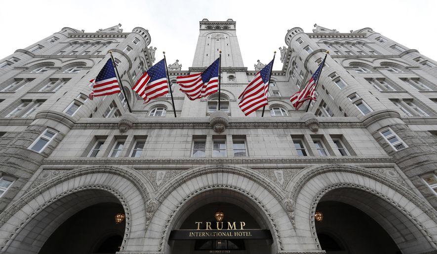 This Dec. 21, 2016, file photo, shows the arched facade of The Trump International Hotel at 1100 Pennsylvania Avenue NW, in Washington. (AP Photo/Alex Brandon, File)