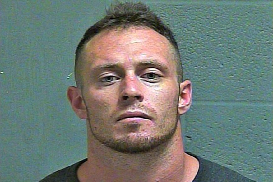 In this photo provided by the Oklahoma County Sheriff's Office, Brandon Killian is pictured in a booking photo dated June 25, 2019. Killian has been charged with a hate crime in the beating of a black man outside of a central Oklahoma music venue last month. (Oklahoma County Sheriff's Office via AP)