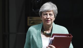 Britain&#x27;s Prime Minister Theresa May leaves 10 Downing Street for her weekly Prime Minister&#x27;s Questions at the House of Commons in London, Wednesday, July 10, 2019. (AP Photo/Alastair Grant)