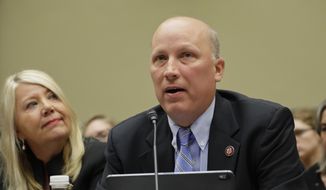 In this file photo, Rep. Chip Roy, R-Texas, right, testifies before the House Oversight Committee hearing on family separation and detention centers, Friday, July 12, 2019, on Capitol Hill in Washington. Also on the panel is Rep. Debbie Lesko, R-Ariz., left. (AP Photo/Pablo Martinez Monsivais) ** FILE **