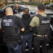 In this Tuesday, Feb. 7, 2017, file photo released by U.S. Immigration and Customs Enforcement, foreign nationals are arrested during a targeted enforcement operation conducted by U.S. Immigration and Customs Enforcement (ICE) aimed at immigration fugitives, re-entrants and at-large criminal aliens in Los Angeles. (Charles Reed/U.S. Immigration and Customs Enforcement via AP) ** FILE **