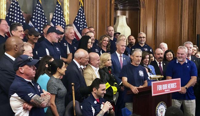 Entertainer and activist Jon Stewart, speaks at a news conference on behalf of 9/11 victims and families, Friday, July 12, 2019, at the Capitol in Washington. The House is expected to approve a bill Friday ensuring that a victims&#x27; compensation fund for the Sept. 11 attacks never runs out of money. (AP Photo/Matthew Daly)
