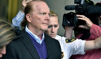 FILE - In this May 24, 2019 file photo, chef Mario Batali departs after pleading not guilty, at municipal court in Boston, to an allegation that he forcibly kissed and groped a woman at a Boston restaurant in 2017. Batali waived his right to appear at a hearing on Friday, July 23 in Boston, and a hearing on defense motions was scheduled at a later date. (AP Photo/Josh Reynolds, File)