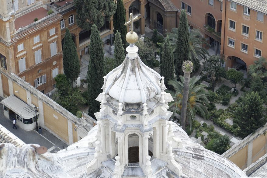 This Wednesday, July 10, 2019 file photo shows the view of the Teutonic Cemetery inside the Vatican. After opening a pair of tombs inside the cemetery after further investigation into the case of the 15-year-old daughter of a Vatican employee, Emanuela Orlandi, who disappeared in 1983 only to find that the tombs were empty, the Vatican said Saturday, July, 13, 2019, it discovered two ossuaries under a manhole that are now the subject of forensic investigation. (AP Photo/Gregorio Borgia)