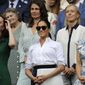 Kate, Duchess of Cambridge, Meghan, Duchess of Sussex and Pippa Matthews, foreground from left to right, stand together during the women&#39;s singles final match on day twelve of the Wimbledon Tennis Championships in London, Saturday, July 13, 2019. (AP Photo/Ben Curtis)