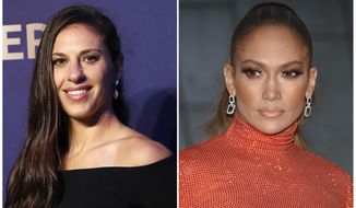 In this combination of file photos Carli Lloyd smiles prior to the women&#x27;s soccer World Cup France 2019 draw, in Boulogne-Billancourt, outside Paris, on Dec. 8, 2018 and Jennifer Lopez attends the CFDA Fashion Awards at the Brooklyn Museum on June 3, 2019, in New York. Lloyd of the U.S. women&#x27;s national soccer team celebrated her recent World Cup victory with a lap dance from J. Lo. Lopez pulled Lloyd from the audience to the stage at Madison Square Garden in New York on Friday, July 12, 2019, working her sensual moves on the soccer star.  (AP Photo)