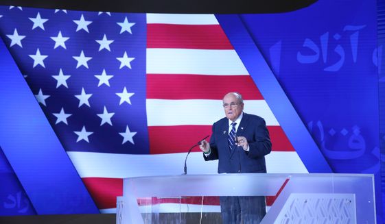 Former New York City Mayor Rudy Giuliani, a close friend of President Trump&#x27;s, addresses a gathering of a Free Iran conference on July 13, 2019, in Tiran, Albania. (Photo provided to The Washington Times courtesy of event organizers.)
