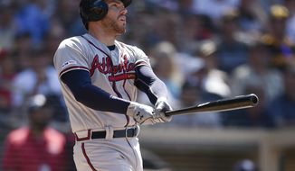 Atlanta Braves&#x27; Freddie Freeman looks up after hitting a three-run home run during the eighth inning of a baseball game against the San Diego Padres in San Diego, Sunday, July 14, 2019. (AP Photo/Kelvin Kuo)
