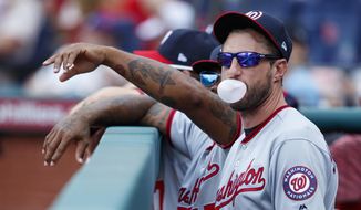 Washington Nationals&#39; Max Scherzer blows a bubble in the dugout during a baseball game against the Philadelphia Phillies, Sunday, July 14, 2019, in Philadelphia. (AP Photo/Matt Slocum) **FILE**