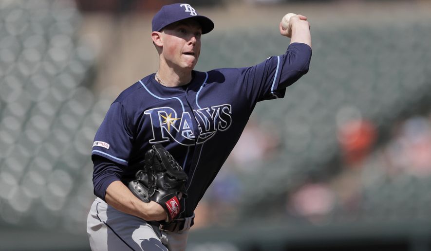 Tampa Bay Rays relief pitcher Ryan Yarbrough throws to the Baltimore Orioles in the ninth inning of a baseball game, Sunday, July 14, 2019, in Baltimore. (AP Photo/Julio Cortez)