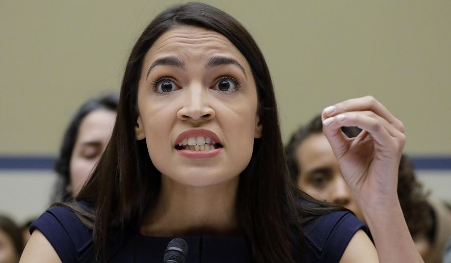 In this Friday, July 12, 2019, file photo, Rep. Alexandria Ocasio-Cortez, D-NY., gestures while testifying before the House Oversight Committee hearing on family separation and detention centers, on Capitol Hill in Washington. (AP Photo/Pablo Martinez Monsivais, File)