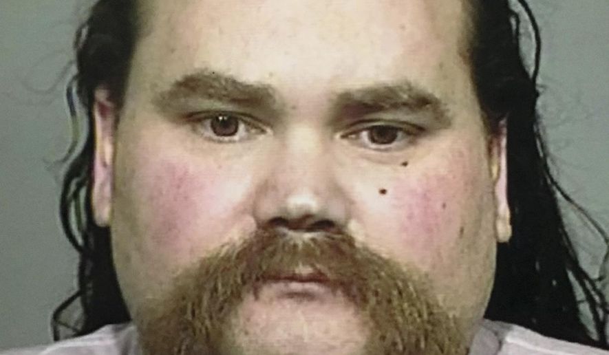 FILE - This undated file photo released by the Sonoma County Sheriff's Office shows Shaun Michael Gallon. The Press Democrat reports that on Monday, July 15, 2019, Gallon had been sentenced to life in prison for killing an engaged couple from Ohio while they were camping on a Northern California beach in 2004. (Sonoma County Sheriff's Office via AP, File)