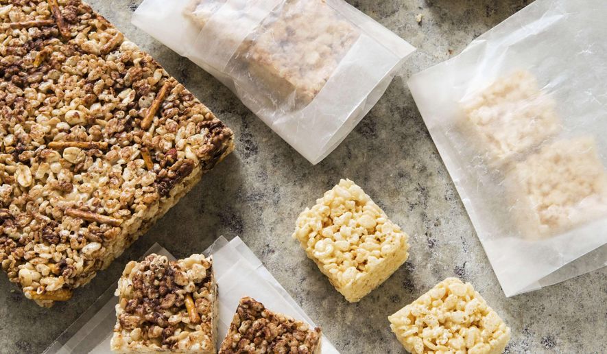 This undated photo provided by America's Test Kitchen in July 2019 shows Rice Crispy Treats in Brookline, Mass. This recipe appears in the cookbook "The Perfect Cookie." (Steve Klise/America's Test Kitchen via AP)