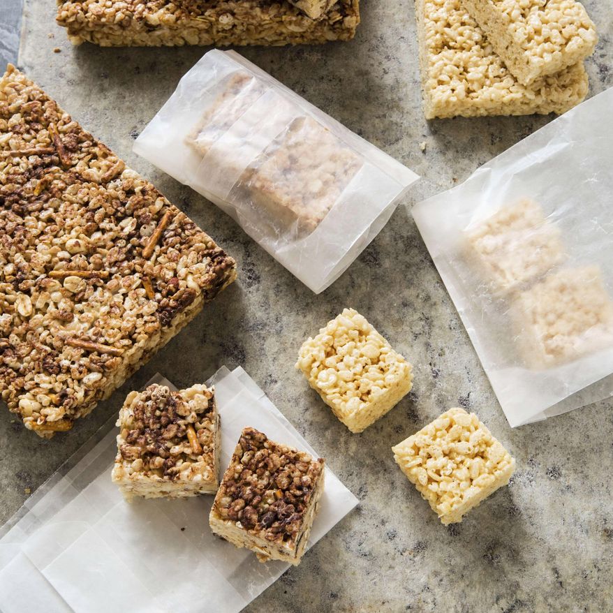 This undated photo provided by America's Test Kitchen in July 2019 shows Rice Crispy Treats in Brookline, Mass. This recipe appears in the cookbook "The Perfect Cookie." (Steve Klise/America's Test Kitchen via AP)
