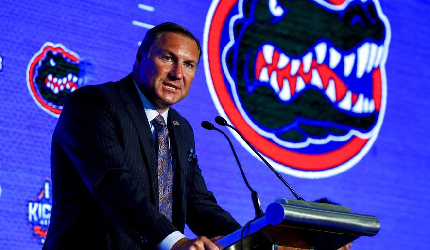 Head Coach Dan Mullen, of Florida, speaks during the NCAA college football Southeastern Conference Media Days, Monday, July 15, 2019, in Hoover, Ala. (AP Photo/Butch Dill)