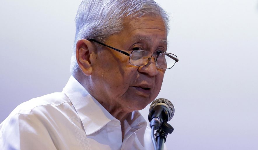 FILE - In this Friday, July 12, 2019, file photo, former Philippine Foreign Secretary Albert del Rosario delivers his speech during a forum on the South China Sea in metropolitan Manila, Philippines. He said that President Rodrigo Duterte's failure to seek Chinese compliance with an arbitration ruling has resulted in "more unlawful acts of intimidation and bullying in the South China Sea." (AP Photo/Aaron Favila, File)