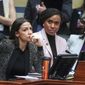 In this Feb. 26, 2019, file photo, Rep. Alexandria Ocasio-Cortez, D-N.Y., left, joined by Rep. Ayanna Pressley, D-Mass., and Rep. Rashida Tlaib, D-Mich., listens during a House Oversight and Reform Committee meeting on Capitol Hill in Washington. In tweets Sunday, July 14, 2019, President Donald Trump portrays the lawmakers as foreign-born troublemakers who should go back to their home countries. In fact, the lawmakers, except one, were born in the U.S. He didn’t identify the women but was referring to Reps. Ocasio-Cortez, Pressley, Tlaib and Ilhan Omar. (AP Photo/J. Scott Applewhite, File)