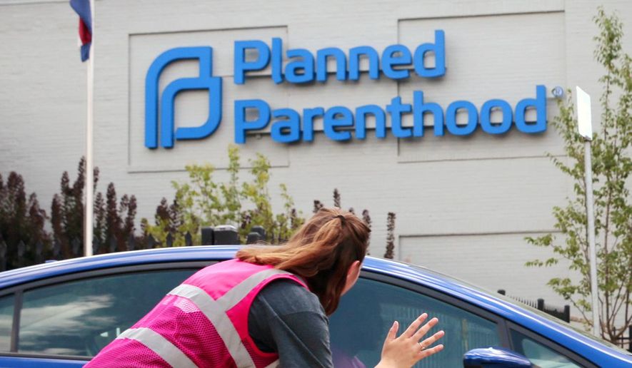 A Planned Parenthood clinic in St. Louis is shown in this June 2019 file photo. The organization&#x27;s political action committee says it will spend $45 million in the 2020 campaign cycle to defeat President Trump, flip the Senate, and influence key state legislative races. (Robert Cohen/St. Louis Post-Dispatch via AP) ** FILE ** 