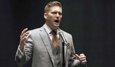 In this Oct. 19, 2017, file photo, white nationalist Richard Spencer speaks at the University of Florida in Gainesville, Fla. Spencer&#39;s wife has accused him of physically, verbally and emotionally abusing her throughout their eight-year marriage. Spencer told The Associated Press on Tuesday, Oct. 23, 2018, that he is &quot;not an abusive person&quot; and said his wife was &quot;never in a dangerous situation.&quot; (AP Photo/Chris O&#39;Meara, File)