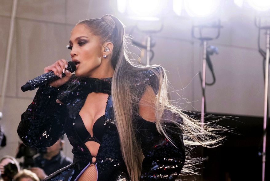 In this May 6, 2019, file photo, Jennifer Lopez performs on NBC's "Today" show at Rockefeller Plaza in New York. Lopez kept her word to fans who were disappointed when a power outage in New York City forced her to postpone her concert. Lopez returned to the stage in Madison Square Garden on Monday, July 15, saying they were going to celebrate “no matter what.” (Photo by Charles Sykes/Invision/AP File)