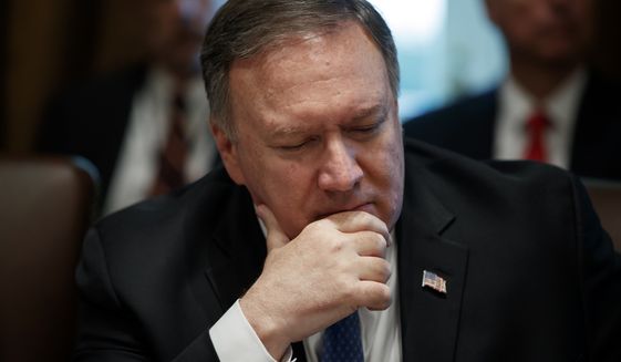 Secretary of State Mike Pompeo listens during a Cabinet meeting in the Cabinet Room of the White House, Tuesday, July 16, 2019, in Washington. (AP Photo/Alex Brandon)