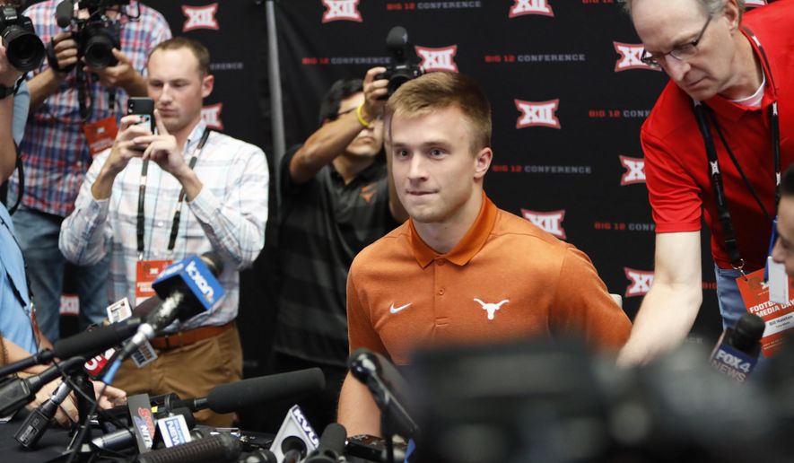 Texas quarterback Sam Ehlinger sits down for interviews during Big 12 Conference NCAA college football media day Tuesday, July 16, 2019, at AT&amp;amp;T Stadium in Arlington, Texas. (AP Photo/David Kent)