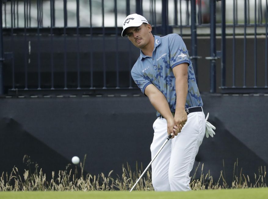 South Africa's Christiaan Bezuidenhout plays a shot to the 3rd green during a practice round ahead of the start of the British Open golf championships at Royal Portrush in Northern Ireland, Tuesday, July 16, 2019. The British Open starts Thursday. (AP Photo/Matt Dunham)