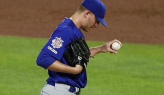 Chicago Cubs relief pitcher Mike Montgomery collects himself on the mound after giving up a three-run home run to Pittsburgh Pirates&#39; Adam Frazier during the fourth inning of a baseball game in Pittsburgh, Tuesday, July 2, 2019. (AP Photo/Gene J. Puskar)