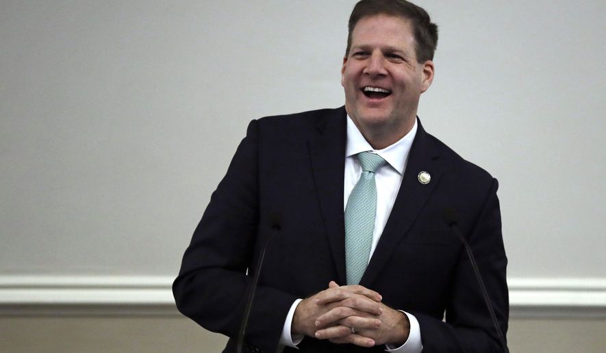 FILE - In this Thursday, Jan. 3, 2019, file photo, Republican Gov. Chris Sununu smiles during his inauguration address during a ceremony at the State House in Concord, N.H. New Hampshire is ending its practice of charging inmates and former inmates for the cost of their incarceration. Sununu signed a bill repealing a 1996 law that allowed the state to seek such payments, which have amounted to an average of $102,000 per year for all inmates in recent years. (AP Photo/Charles Krupa, File)