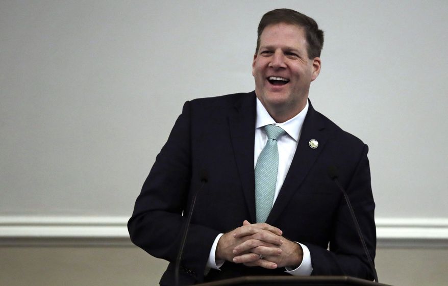 FILE - In this Thursday, Jan. 3, 2019, file photo, Republican Gov. Chris Sununu smiles during his inauguration address during a ceremony at the State House in Concord, N.H. New Hampshire is ending its practice of charging inmates and former inmates for the cost of their incarceration. Sununu signed a bill repealing a 1996 law that allowed the state to seek such payments, which have amounted to an average of $102,000 per year for all inmates in recent years. (AP Photo/Charles Krupa, File)