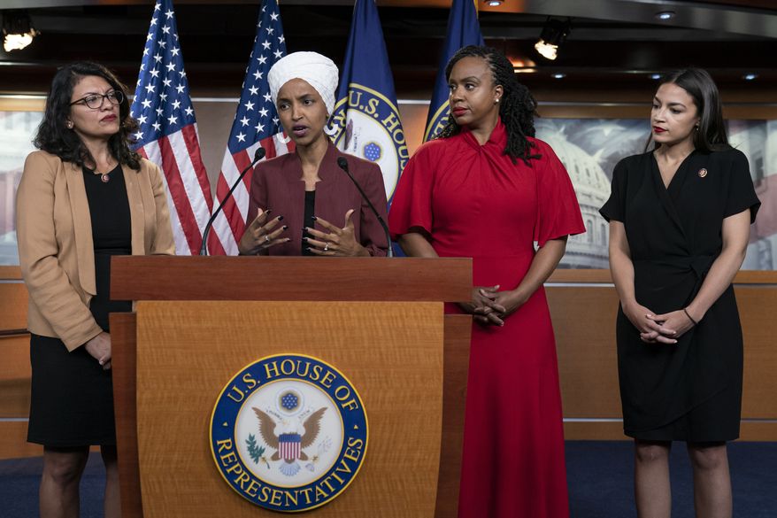 In this Monday, July 15, 2019, file photo, U.S. Rep. Ilhan Omar, D-Minn, second from left, speaks, as U.S. Reps., from left, Rashida Tlaib, D-Mich.,Ayanna Pressley, D-Mass., and Alexandria Ocasio-Cortez, D-N.Y., listen, during a news conference at the Capitol in Washington. (AP Photo/J. Scott Applewhite, File)