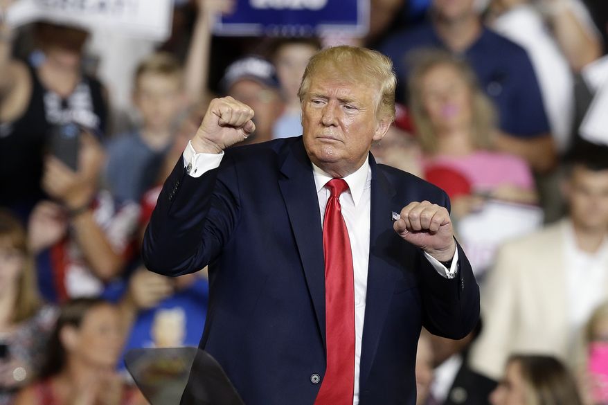 President Donald Trump gestures while speaking at a campaign rally in Greenville, N.C., Wednesday, July 17, 2019. (AP Photo/Gerry Broome)