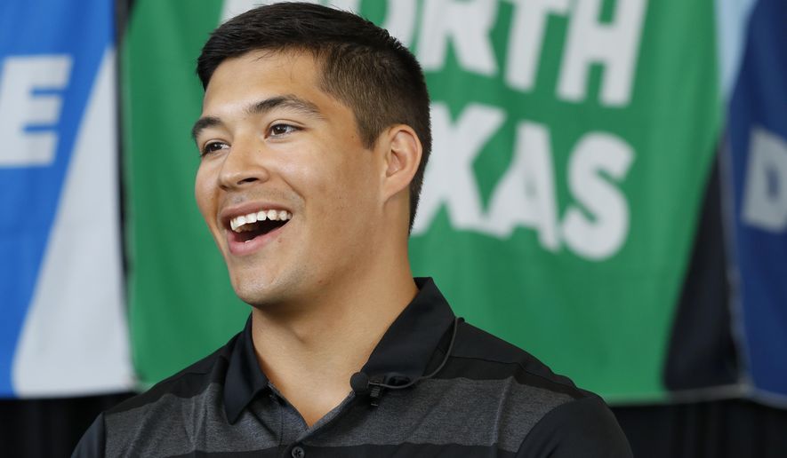 North Texas quarterback Mason Fine responds to questions in an interview during the Conference USA college football media day Wednesday, July 17, 2019, in Frisco, Texas. (AP Photo/Tony Gutierrez)