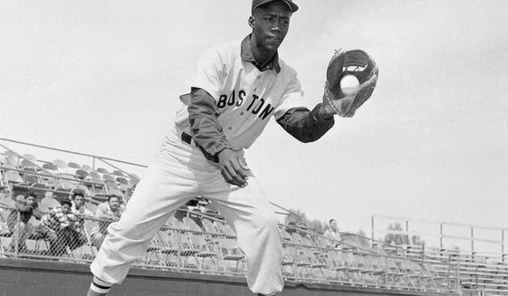 FILE - In this April 1959 file photo, Boston Red Sox&#39;s Elijah &amp;quot;Pumpsie&amp;quot; Green poses for a photo, location not known. Green, the first black player on the Red Sox, has died. He was 85. A Red Sox spokesman confirmed his death Wednesday night, July 17, 2019. (AP Photo/Harold Filan, File)