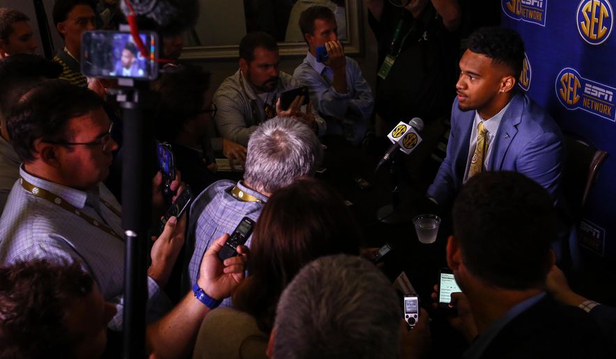 Alabama quarterback Tua Tagovailoa speaks to reporters during the NCAA college football Southeastern Conference Media Days, Wednesday, July 17, 2019, in Hoover, Ala. (AP Photo/Butch Dill)