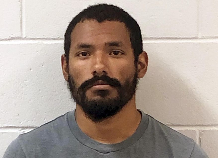 This Tuesday, July 16, 2019 booking photo released by the Keene, Police Department shows Alexander Waterbury, of Keene, N.H., who was arrested Tuesday and charged with four counts of felonious sexual assault and two counts of prohibited sales of alcohol. Police said that Waterbury coached the girls soccer team at Monadnock Regional Middle-High School in Swanzey at the time of the alleged assaults, but It is unclear if the victim was on the team. (Keene Police Department via AP)