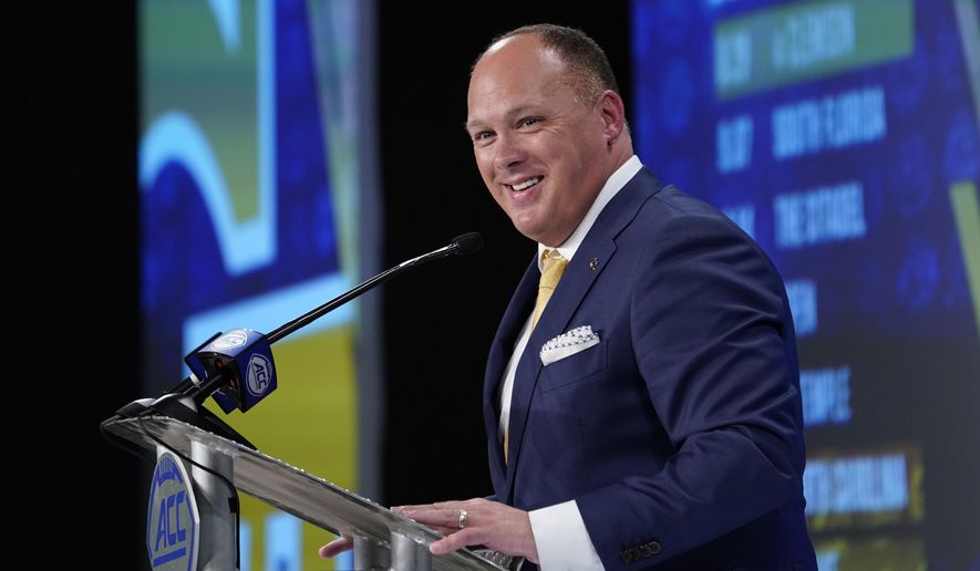 Georgia Tech head coach Geoff Collins speaks during the Atlantic Coast Conference NCAA college football media days in Charlotte, N.C., Thursday, July 18, 2019. (AP Photo/Chuck Burton)