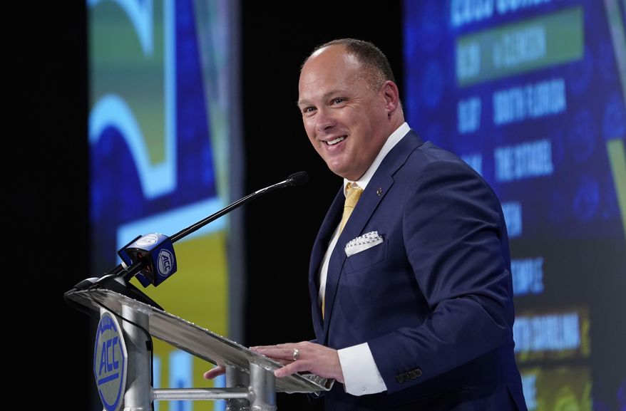 Georgia Tech head coach Geoff Collins speaks during the Atlantic Coast Conference NCAA college football media days in Charlotte, N.C., Thursday, July 18, 2019. (AP Photo/Chuck Burton)