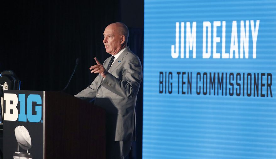 Big Ten Commissioner Jim Delany responds to a question during the Big Ten Conference NCAA college football media days Thursday, July 18, 2019, in Chicago. (AP Photo/Charles Rex Arbogast)