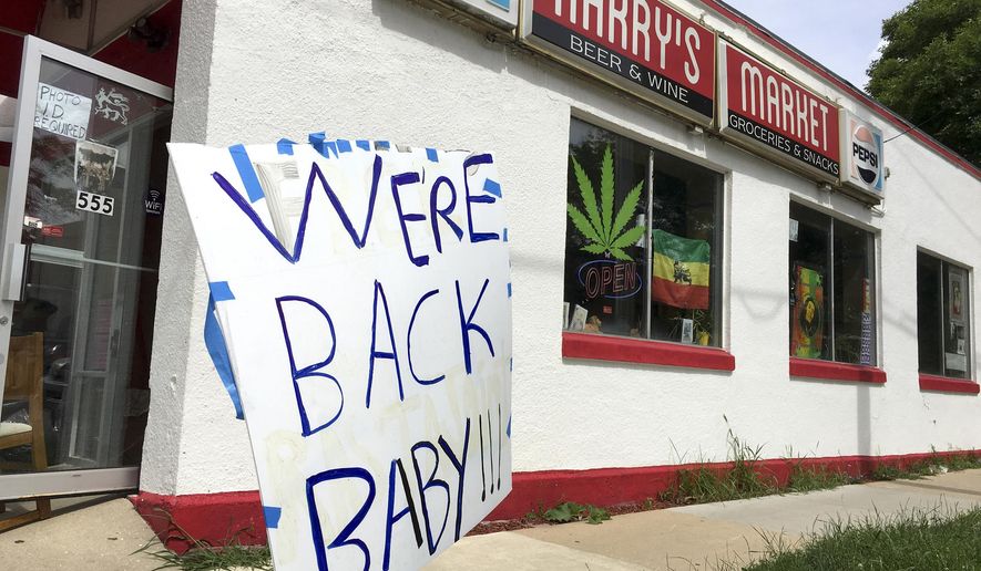 A self-styled Rastafarian church in Downtown Madison, Wis., has reopened, but without the prior acceptance of "donations" from church members in exchange for dispensations of what was regarded as marijuana "sacrament," on West Mifflin Street in Madison, Wis., Wednesday, July 17, 2019. (Dean Mosiman/Wisconsin State Journal via AP)