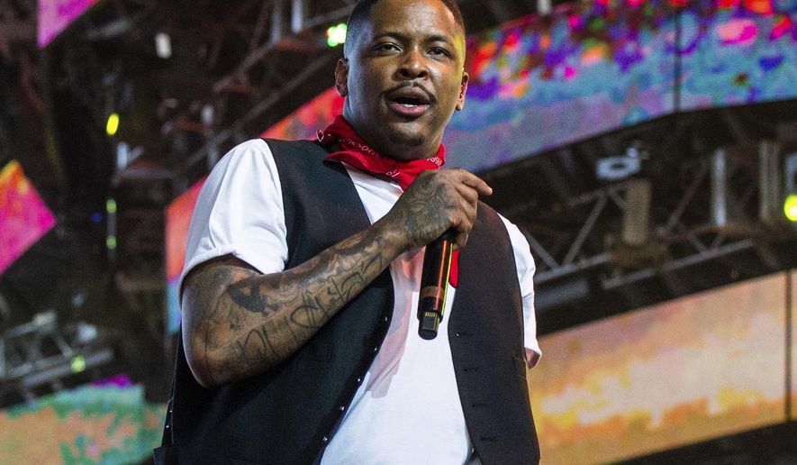 FILE - This April 14, 2019 file photo shows YG performing at the Coachella Music & Arts Festival in Indio, Calif. Authorities say they searched the home of rapper YG in connection with a police-involved shooting in Compton on July 3. A spokesman for the Los Angeles Sheriff’s Department said on Thursday, July 18, 2019, the rapper, whose real name is Keenon Jackson, has not been implicated in the shooting and was not home at the time of the raid. (Photo by Amy Harris/Invision/AP, File)