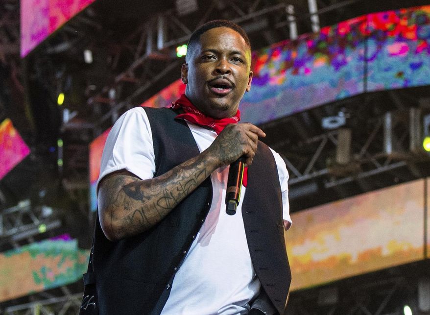 FILE - This April 14, 2019 file photo shows YG performing at the Coachella Music & Arts Festival in Indio, Calif. Authorities say they searched the home of rapper YG in connection with a police-involved shooting in Compton on July 3. A spokesman for the Los Angeles Sheriff’s Department said on Thursday, July 18, 2019, the rapper, whose real name is Keenon Jackson, has not been implicated in the shooting and was not home at the time of the raid. (Photo by Amy Harris/Invision/AP, File)