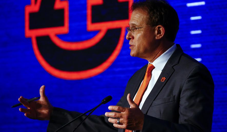 Auburn head coach Gus Malzahn speaks to reporters during the NCAA college football Southeastern Conference Media Days, Thursday, July 18, 2019, in Hoover, Ala. (AP Photo/Butch Dill)