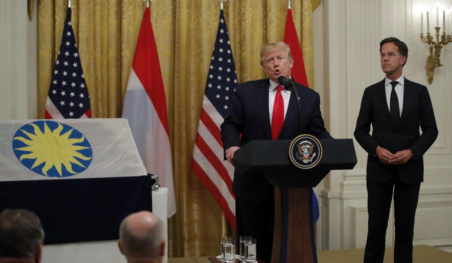 President Donald Trump speaks during a ceremony where Dutch Prime Minister Mark Rutte will present a 48-star flag flown on a U.S. Naval vessel during the D-Day invasion, in the East Room of the White House, Thursday, July 18, 2019, in Washington. The flag will be given to the Smithsonian's National Museum of American History. The vessel was control vessel Landing Craft, Control 60 (LCC 60). (AP Photo/Carolyn Kaster)