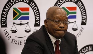 Former South African president Jacob Zuma, at the state commission that is probing wide-ranging allegations of corruption in government and state-owned companies in Johannesburg, Friday, July 19, 2019. Zuma has denied corruption allegations against him, saying the charges are part of an international intelligence conspiracy that started more than 25 years ago to assassinate his character. (Pool Photo via AP)