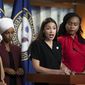 In this July 15, 2019, photo, Rep. Alexandria Ocasio-Cortez, D-N.Y., speaks as, from left, Rep. Rashida Tlaib, D-Mich., Rep. Ilhan Omar, D-Minn., and Rep. Ayanna Pressley, D-Mass., listen during a news conference at the Capitol in Washington. Long before President Donald Trump attacked the four Democratic congresswomen of color, saying they should “go back” to their home countries, they were targets of hateful rhetoric and disinformation online.(AP Photo/J. Scott Applewhite) **FILE**