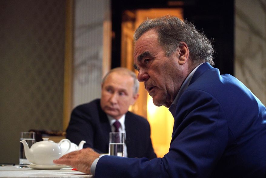 This photo taken on Wednesday, June 19, 2019, and distributed by Kremlin Press Service shows Russian President Vladimir Putin during an interview with American movie director Oliver Stone for his "Revealing Ukraine" documentary in the Kremlin in Moscow, Russia. (Alexei Druzhinin, Sputnik, Kremlin Pool Photo via AP)