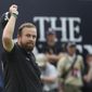 Ireland&#39;s Shane Lowry reacts to the crowd on the 18th green during the third round of the British Open Golf Championships at Royal Portrush in Northern Ireland, Saturday, July 20, 2019.(AP Photo/Jon Super)